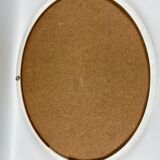 Oval mirror in white melaminate wood