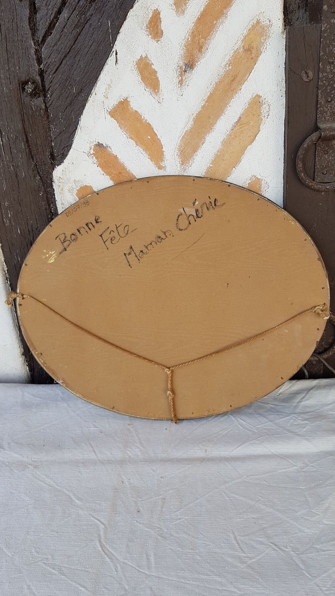 Art Deco golden oval mirror