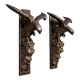 Rare pair of patinated wooden wall consoles, featuring two eagles with outstretched wings.