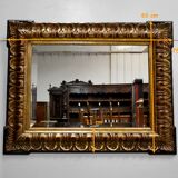 Gold-tinted wooden and stucco rectangular mirror - 1920
