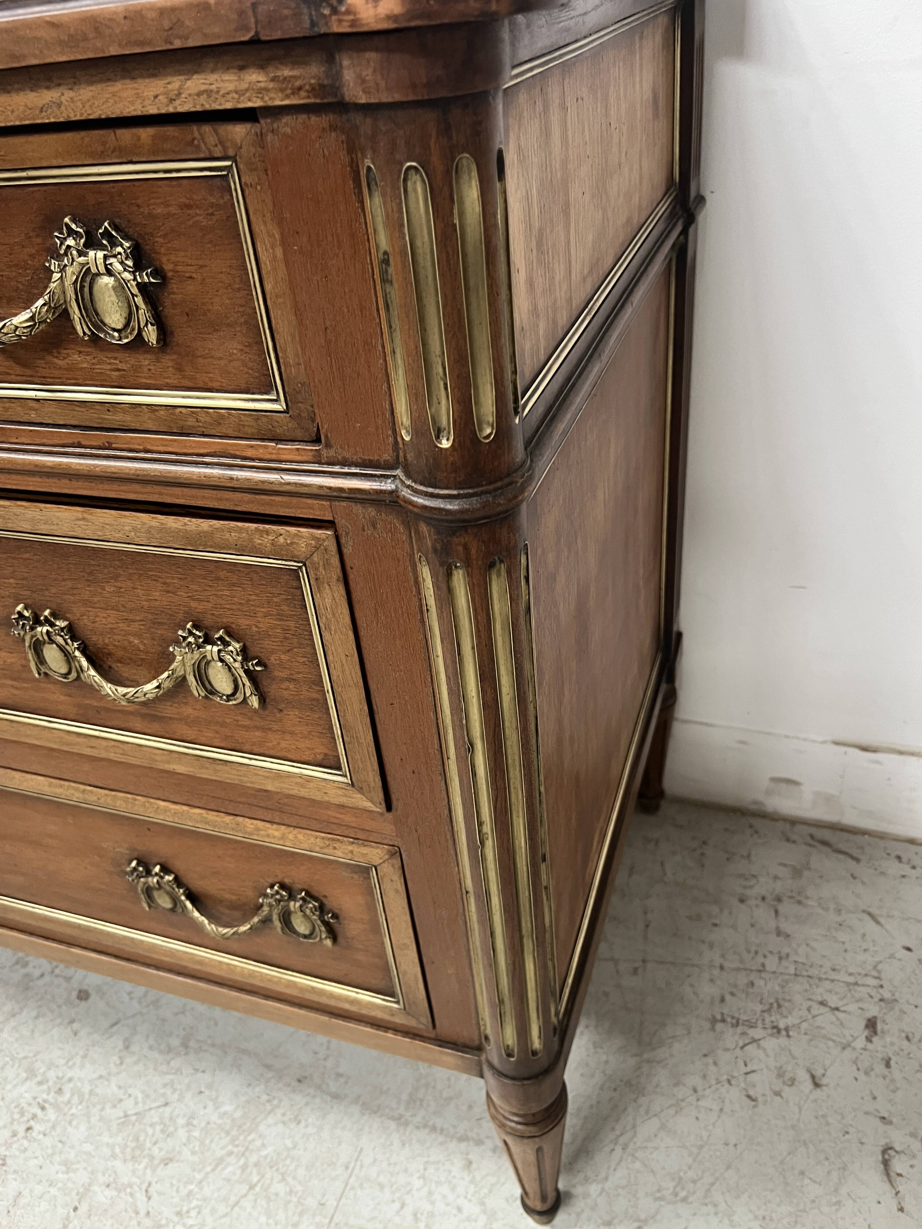 Louis XVI style mahogany commode with a grey veined marble top, 19th century