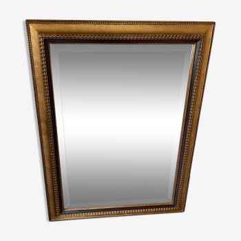 Mirror gilded frame black net and beveled ice used