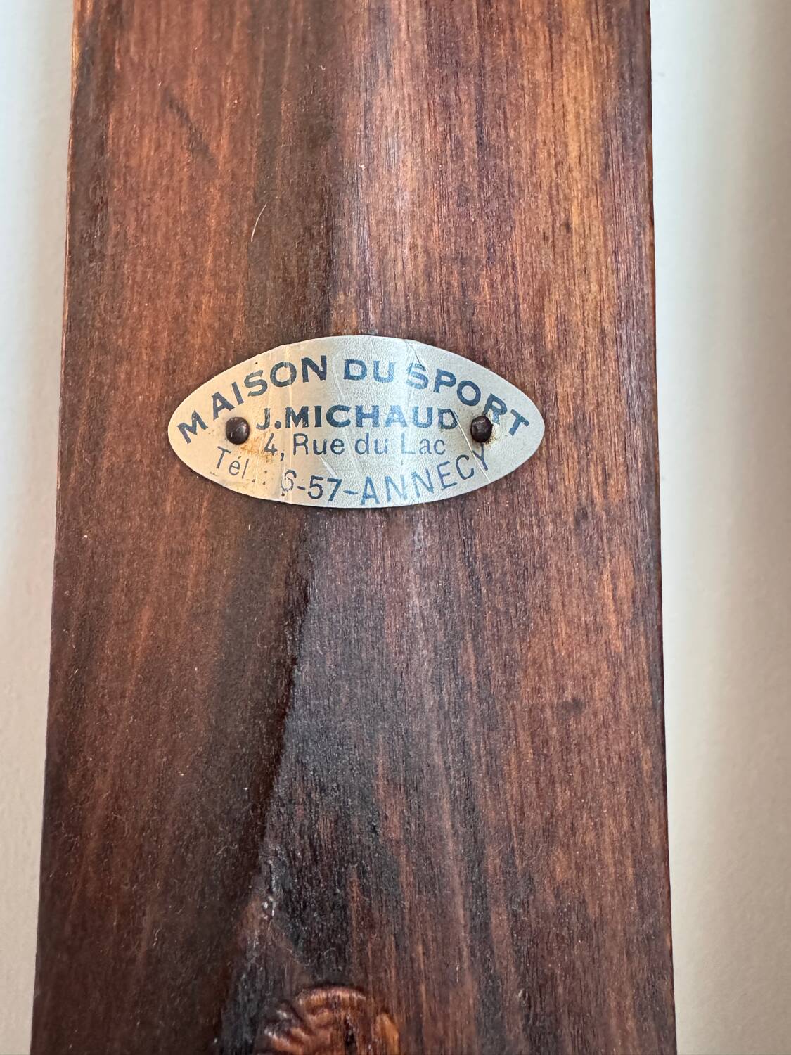 Antique wooden skis with vintage poles