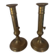 Pair of brass push-button candlesticks