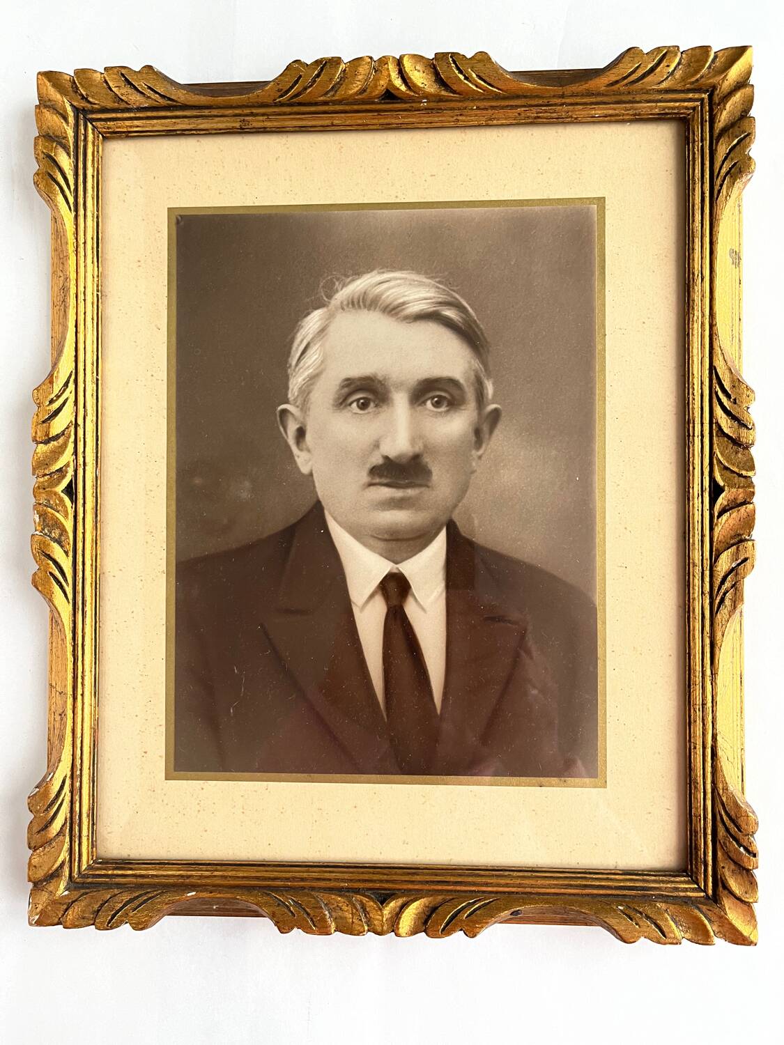 Old photo framed under glass