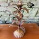 Pair of candlesticks with golden leaves from the 1960s.