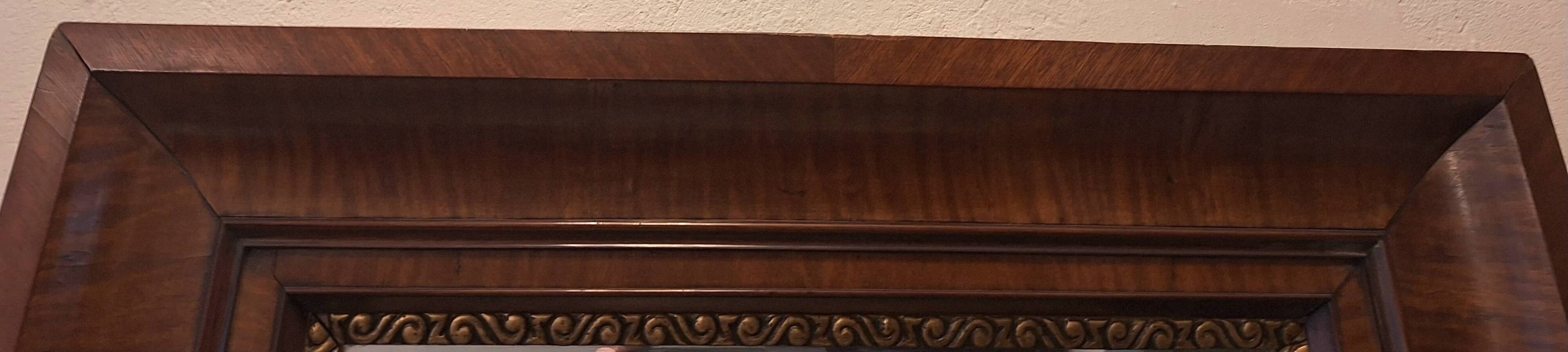 Antique beveled edge mirror in walnut frame, circa 1850
