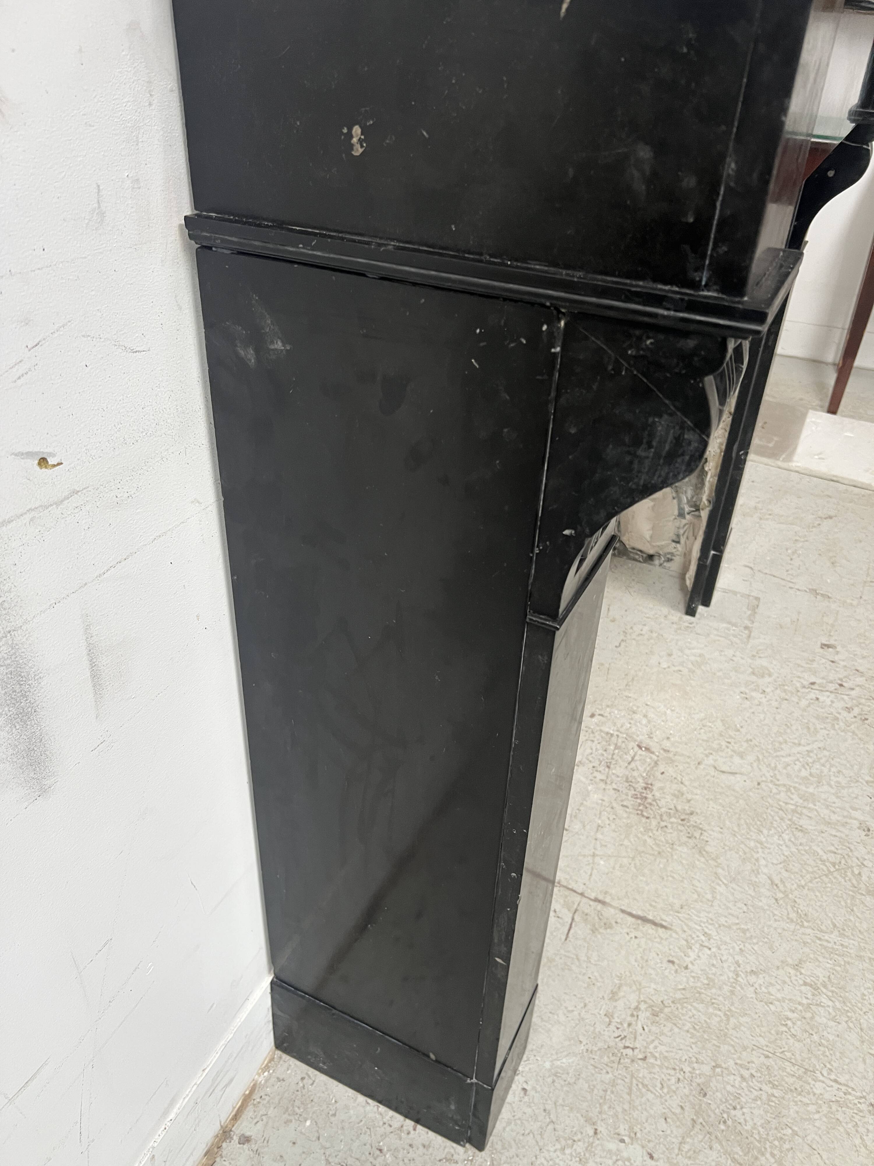 Napoleon III period fireplace with a black marble corbel. 19th century.