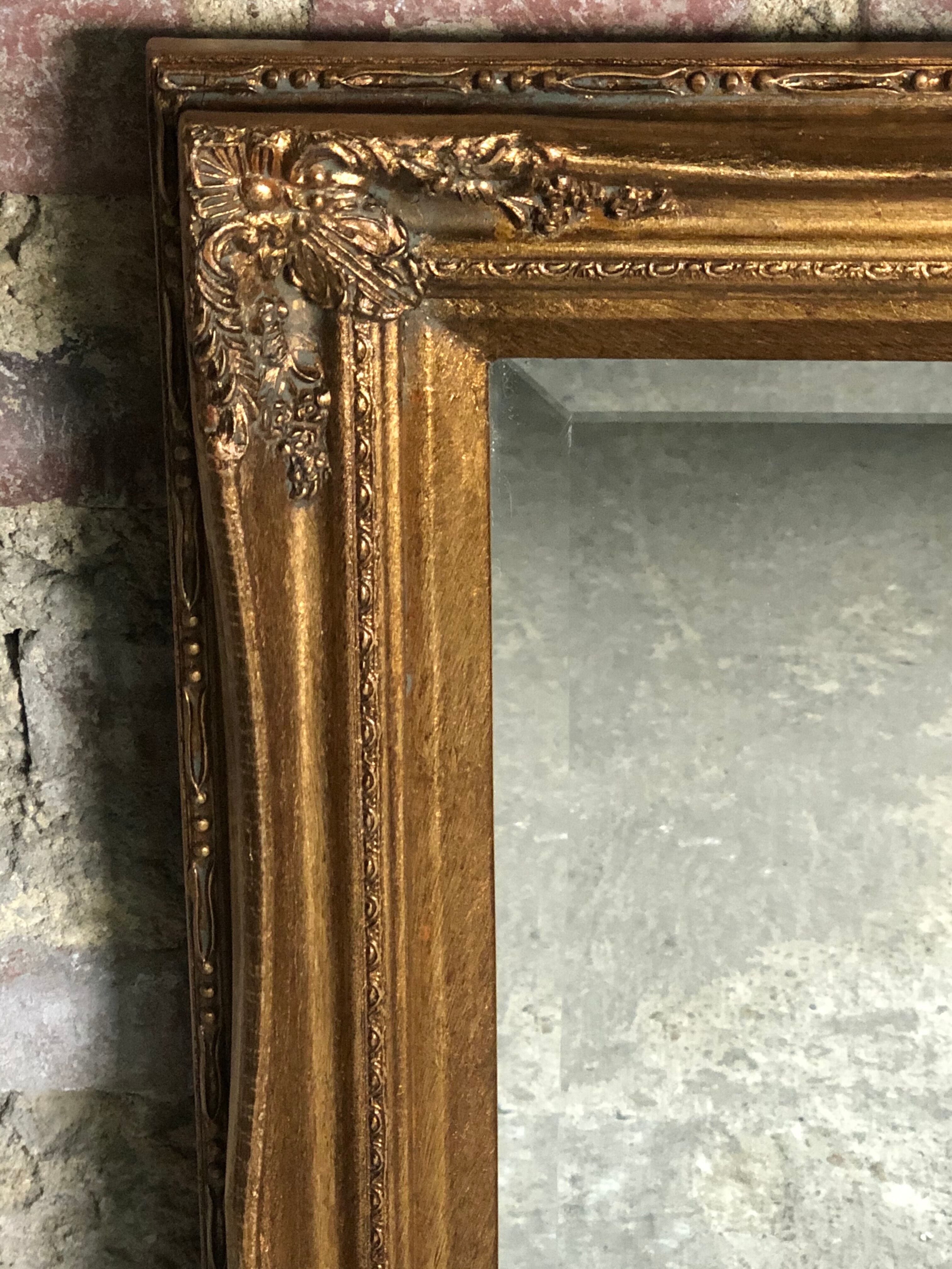 Oval mirror style Louis XV patinated gold 63 x 53 cm