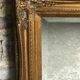Oval mirror style Louis XV patinated gold 63 x 53 cm