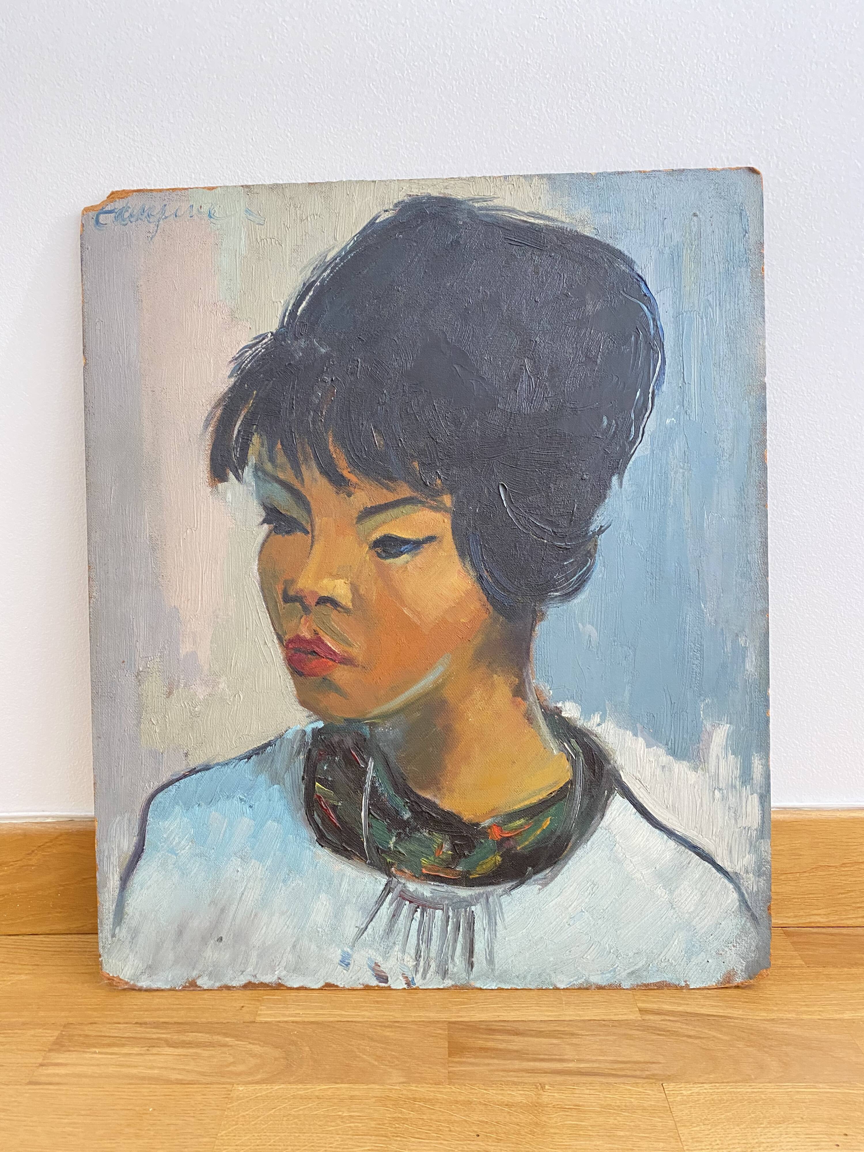 Portrait of a woman in oil on panel