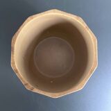 Ceramic flowerpot with wood decor