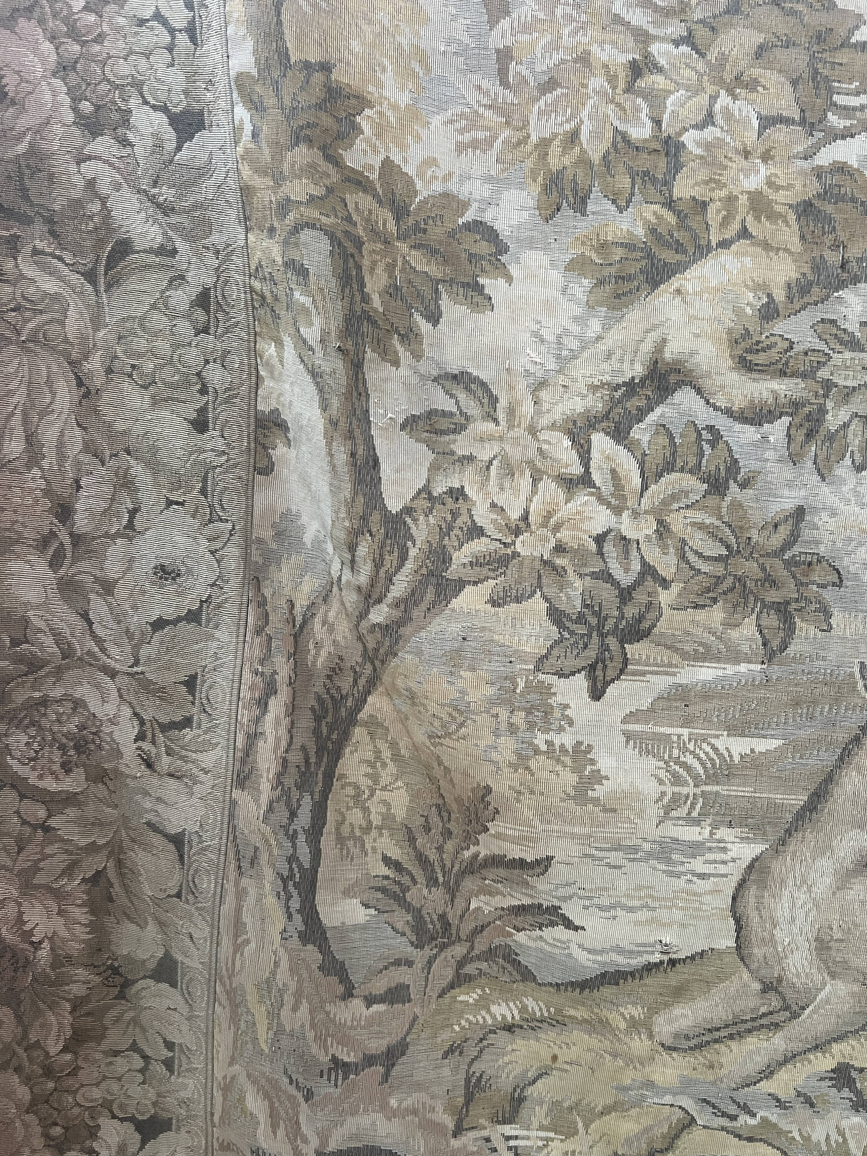 Renaissance-style tapestry with animal motifs, 20th century.