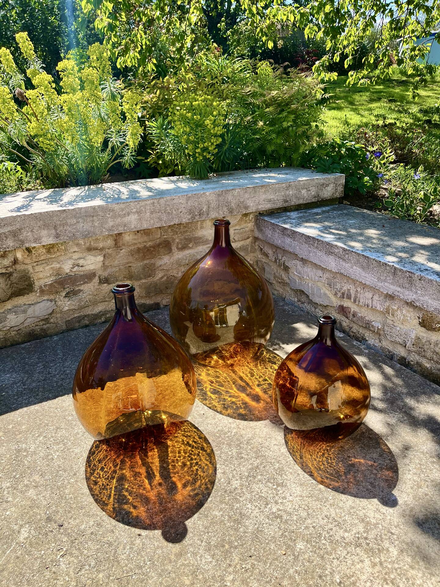 Lot de 3 dame-jeanne ambrées