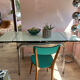 Green water Formica table with its 2 extensions.