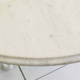 Round marble table with central cast iron leg
