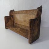 carved wooden shelf