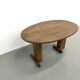 Oval table with T-shaped legs, solid oak, student woodworking project.
