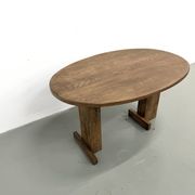 Oval table with T-shaped legs, solid oak, student woodworking project.