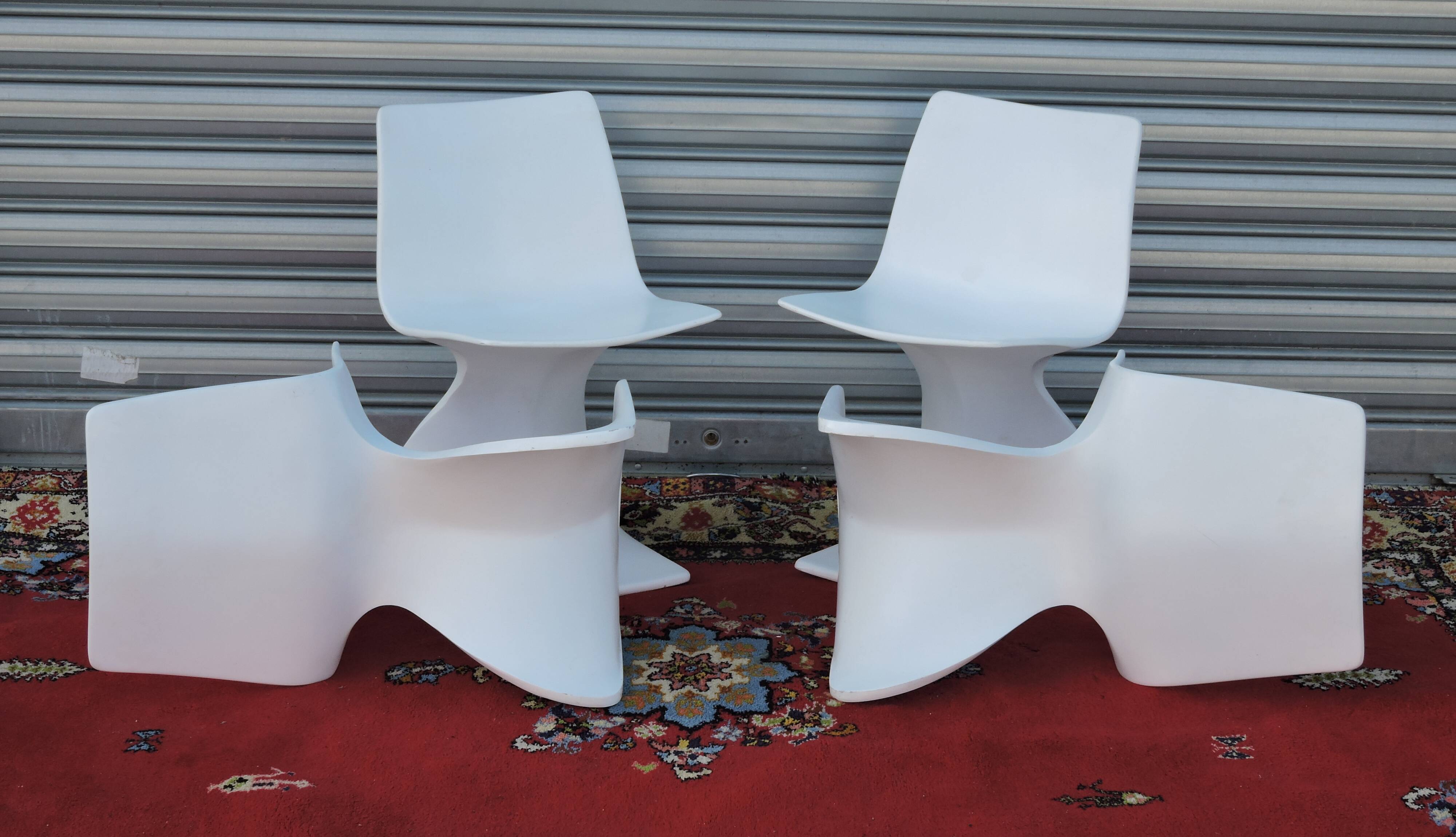 Set of four chairs " Naila " by Christian Adam. Edition Newform