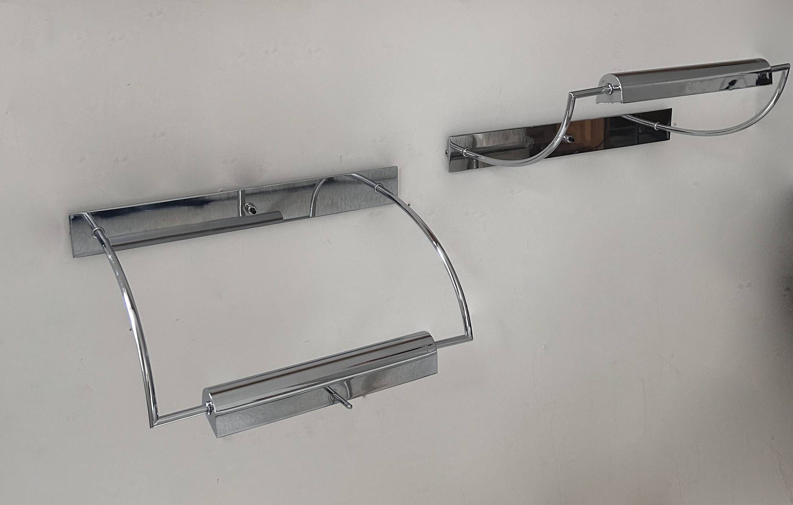 Pair of vintage adjustable wall lights, chrome metal, France 1970.