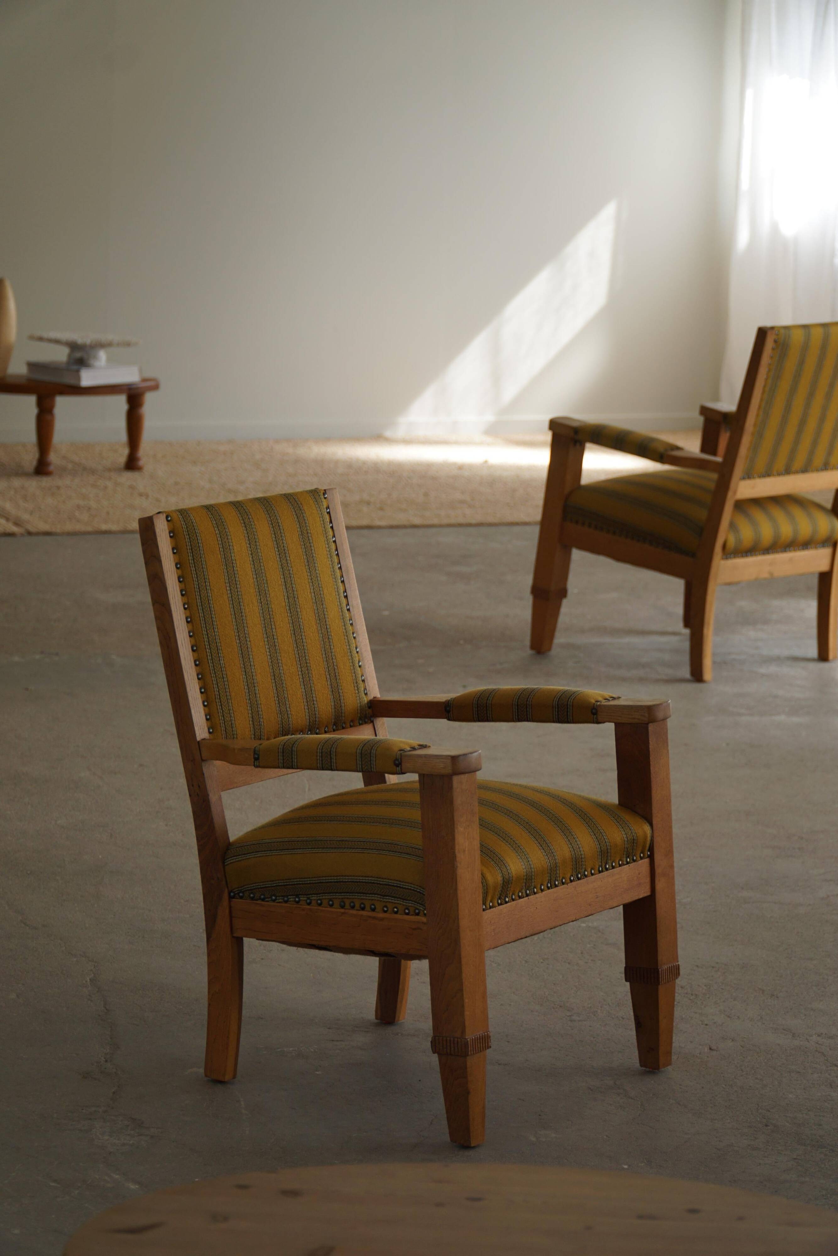 Pair of Art Deco armchairs in oak and fabric, Danish cabinetmaker, 1940s