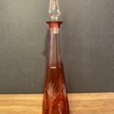 Piriform decanter in cut and tinted red crystal Overlay, Baccarat, Saint Louis