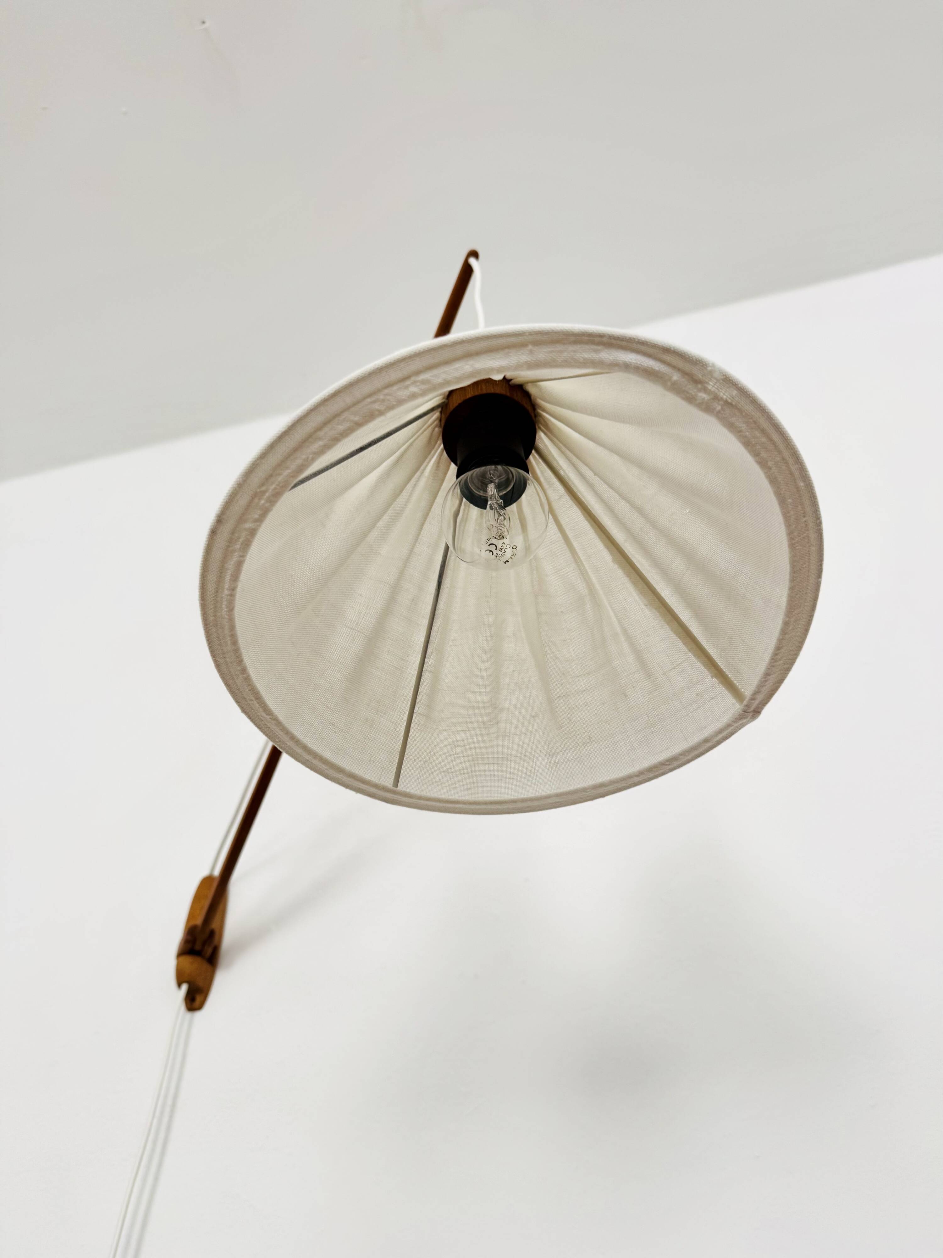 Danish Adjustable Oak Wall Lamp by Uno and Östen Kristiansson