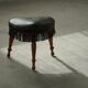 Danish oak tripod stool from the early 20th century with leather fringe, 1930s.