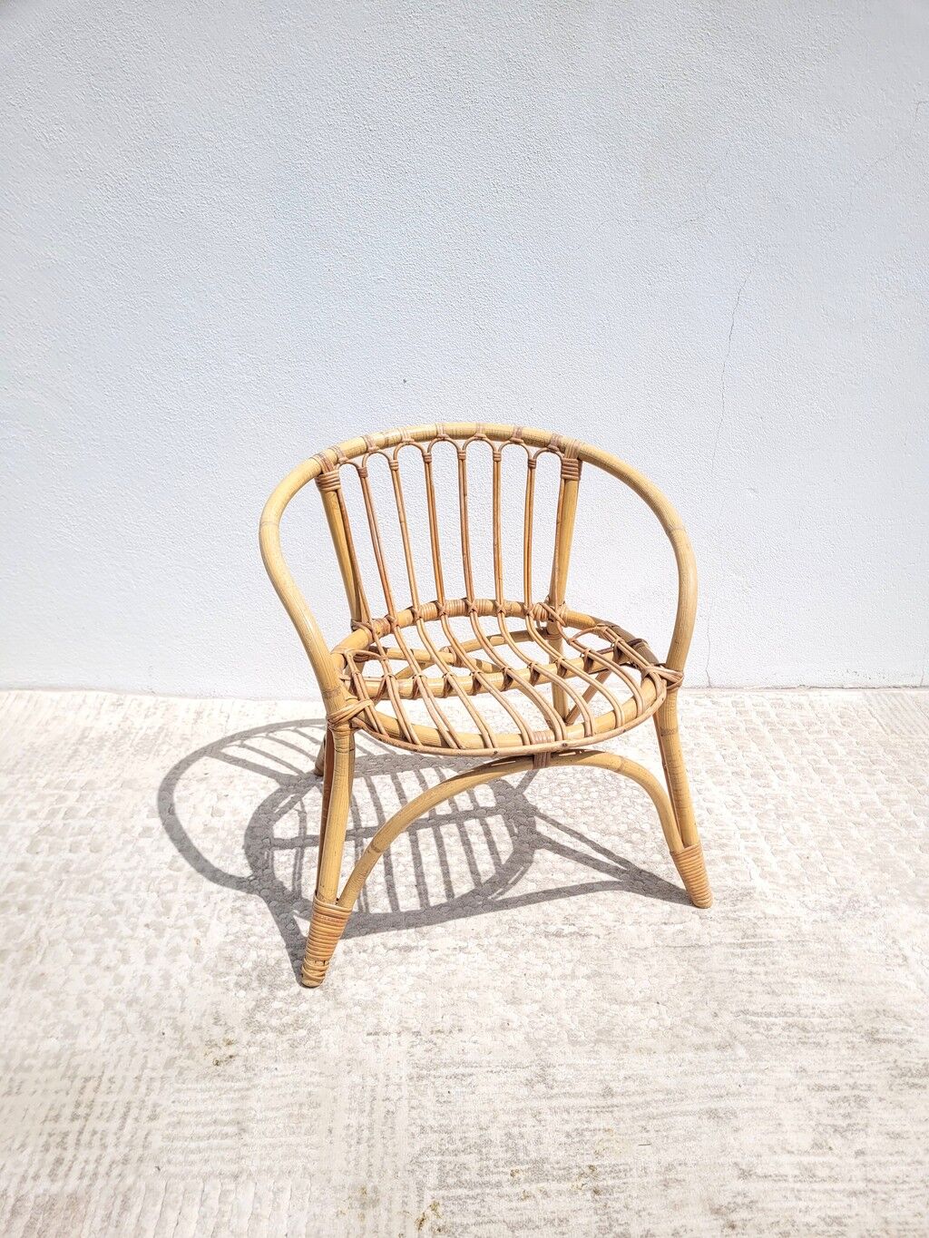 Small vintage rattan children's armchair