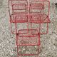 Set of 5 vintage red metal mesh folding chairs, Ted Net style.