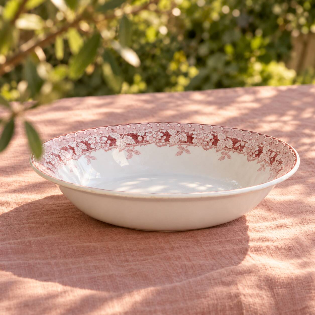 Pink ironstone salad bowl signed St Amand, Mûrier collection.