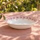 Pink ironstone salad bowl signed St Amand, Mûrier collection.