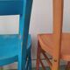 Pair of bistro chairs in patinated wood