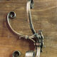 Double wall hook in genuine bronze, Bistrot - Art Nouveau style.
