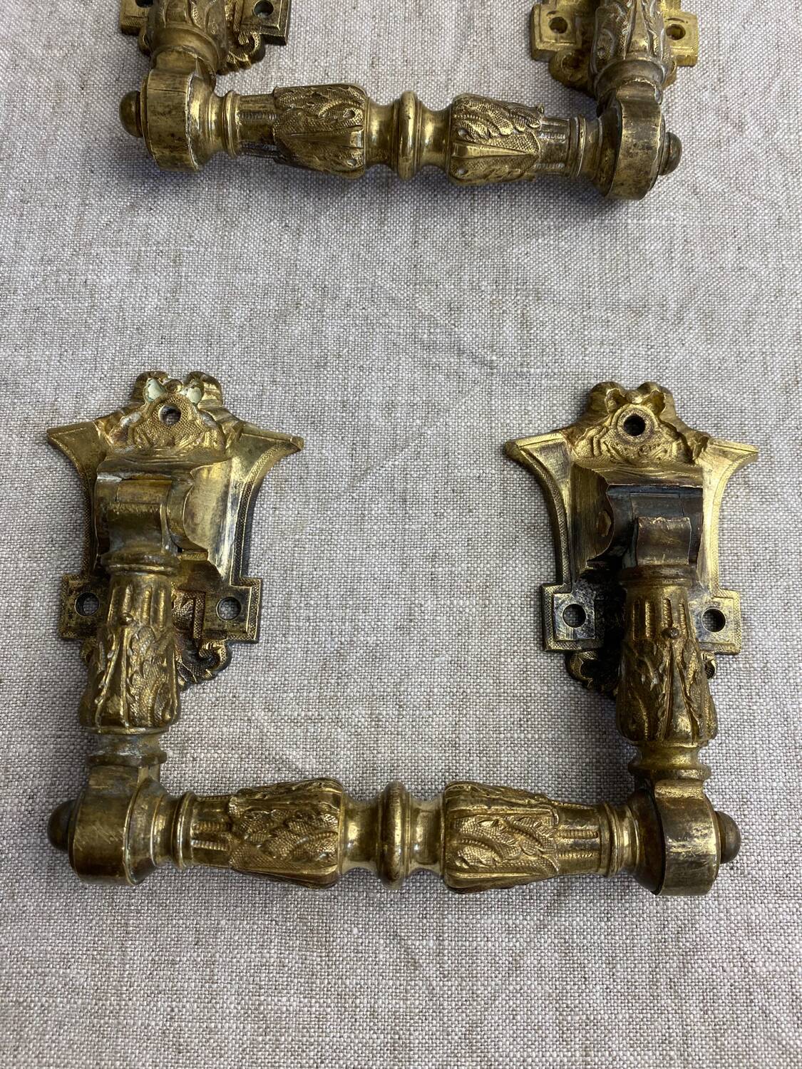 Articulated bronze handles