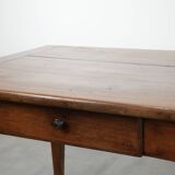 Elegant and subtle antique French dining table made of fruitwood