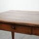 Elegant and subtle antique French dining table made of fruitwood