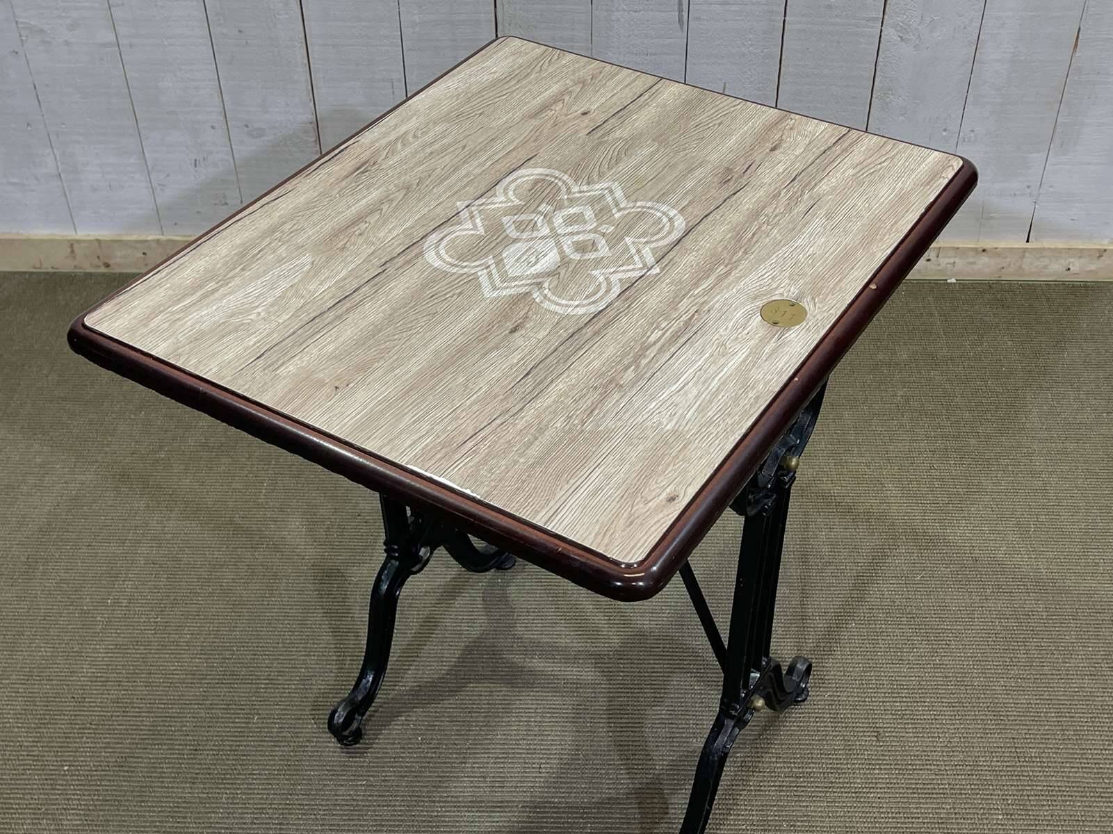 Bistro table with cast iron base - modern design