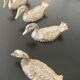 10 duck-shaped knife holders in silver-colored metal