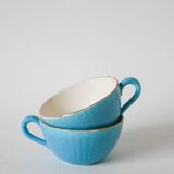 Pair of digoin sarreguemines cups textured sky blue and gold edging 1950
