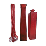 Set of three red bottles