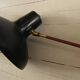 Adjustable wall lamp in black lacquered iron and brass, Italy, circa 1950