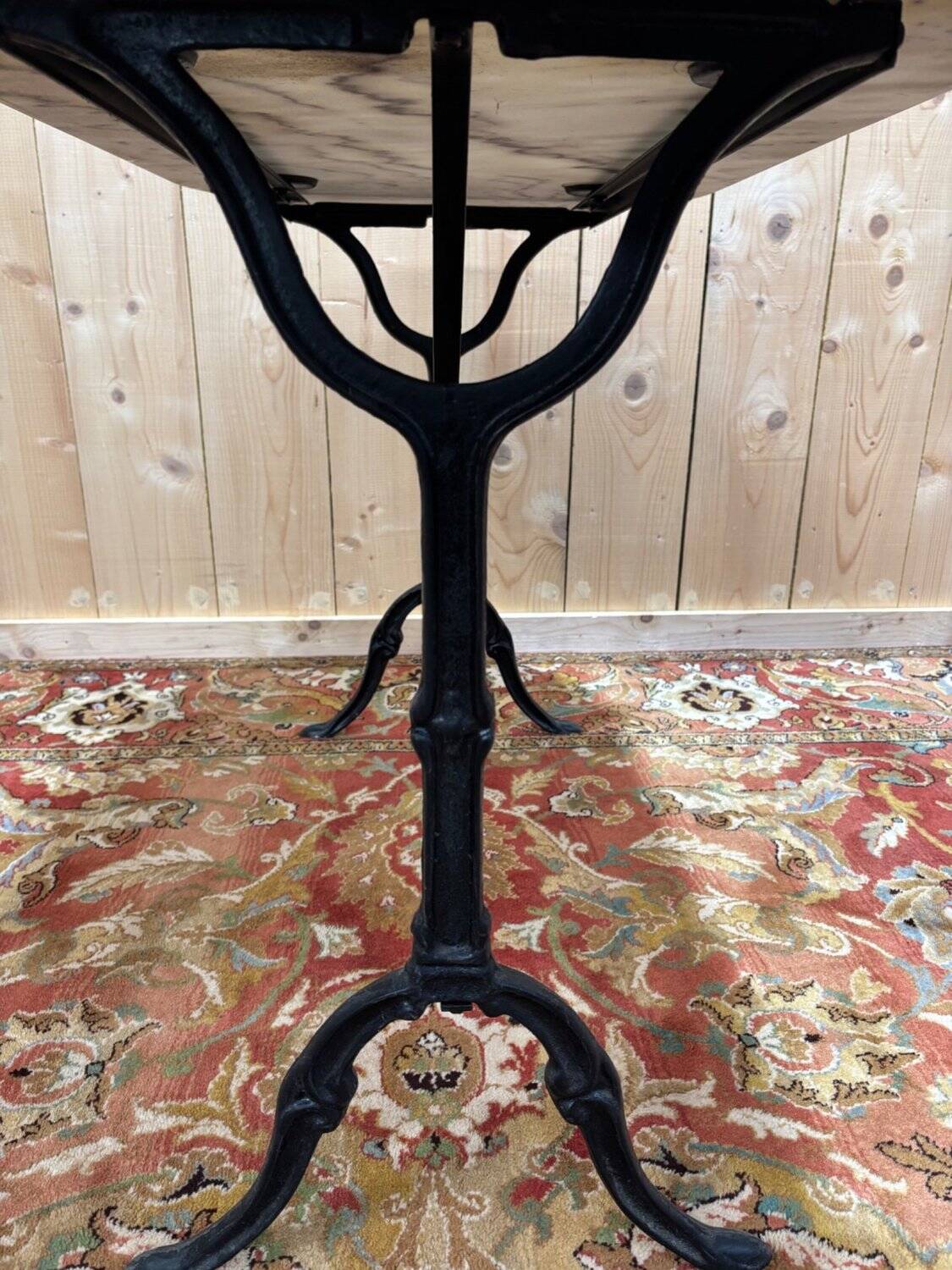 Authentic bistro table with white marble and cast iron from the early 20th century.