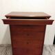 Wooden chest of drawers with a secret drawer