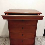 Wooden chest of drawers with a secret drawer