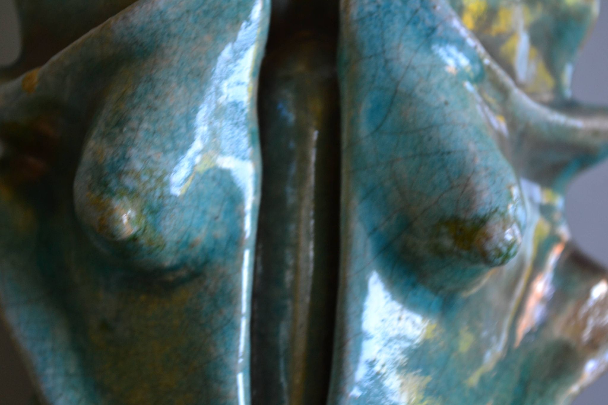 Surreal ceramic sculpture in relief signed to be identified.