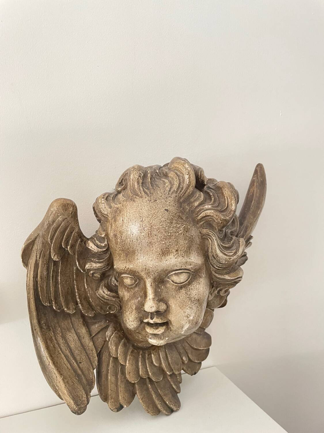 Old plaster angel head