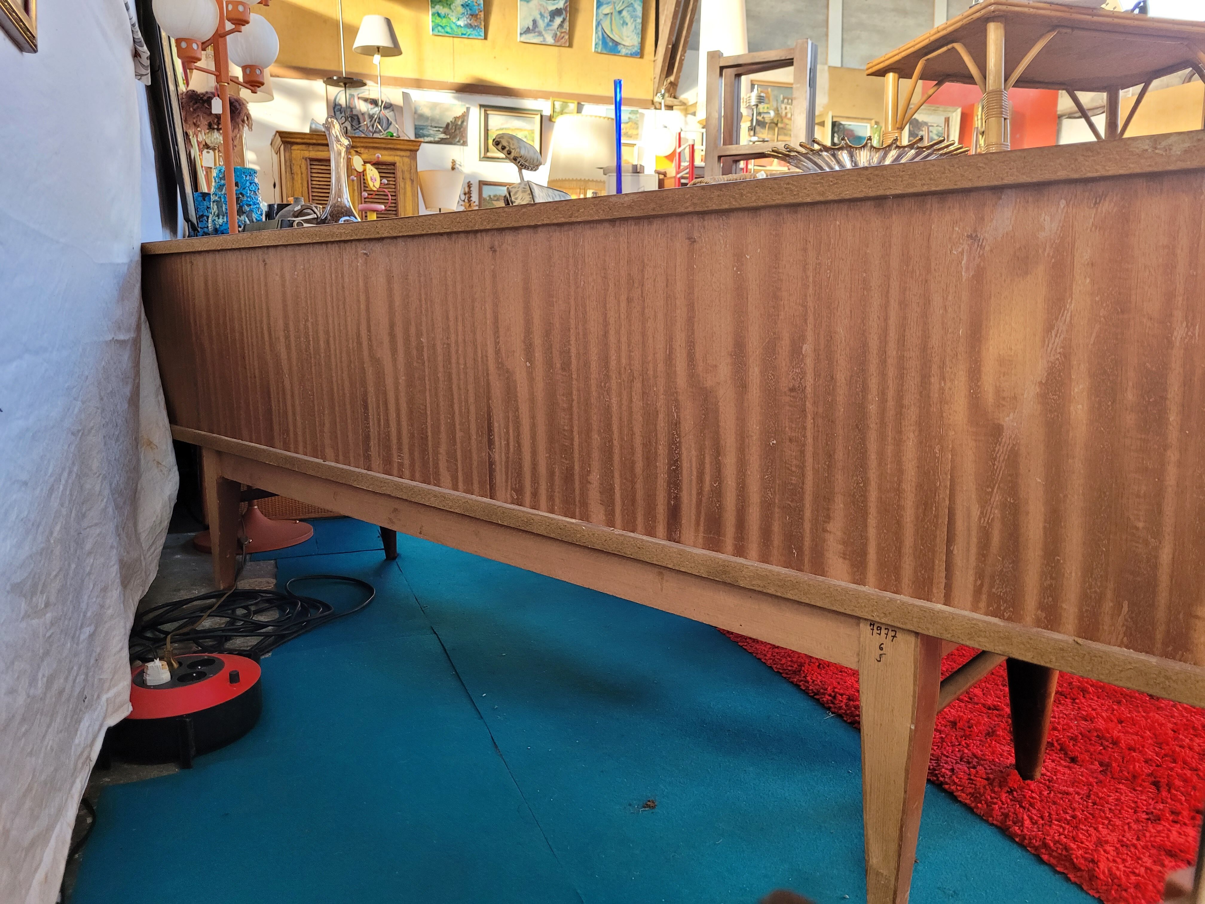 Scandinavian enfilade of the 70s, teak plated.