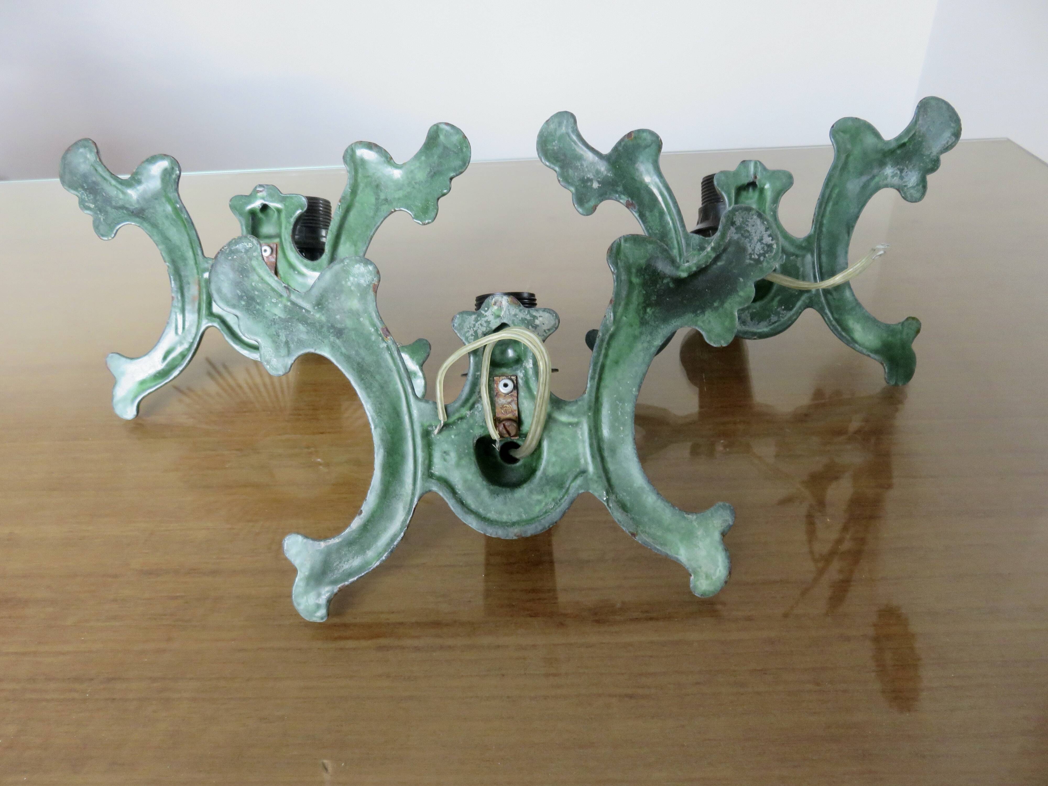 Series of 3 green enameled cast iron wall lights from the 30s and 40s